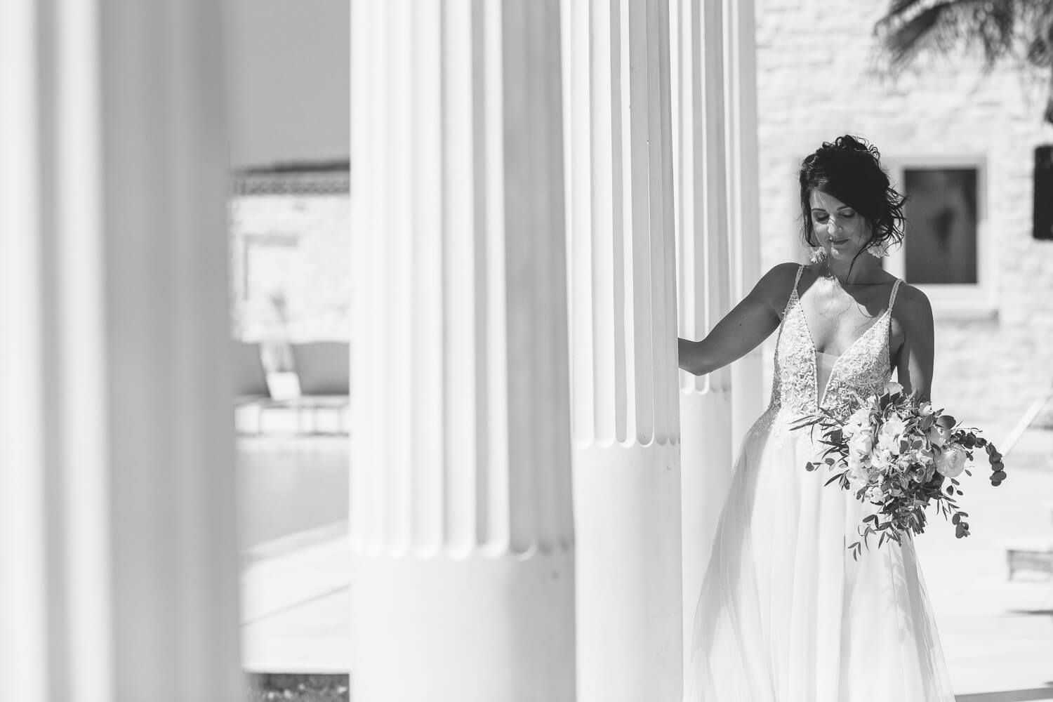 Bride Erika posing before her Catholic Italian wedding in Paros at Villa Aethra