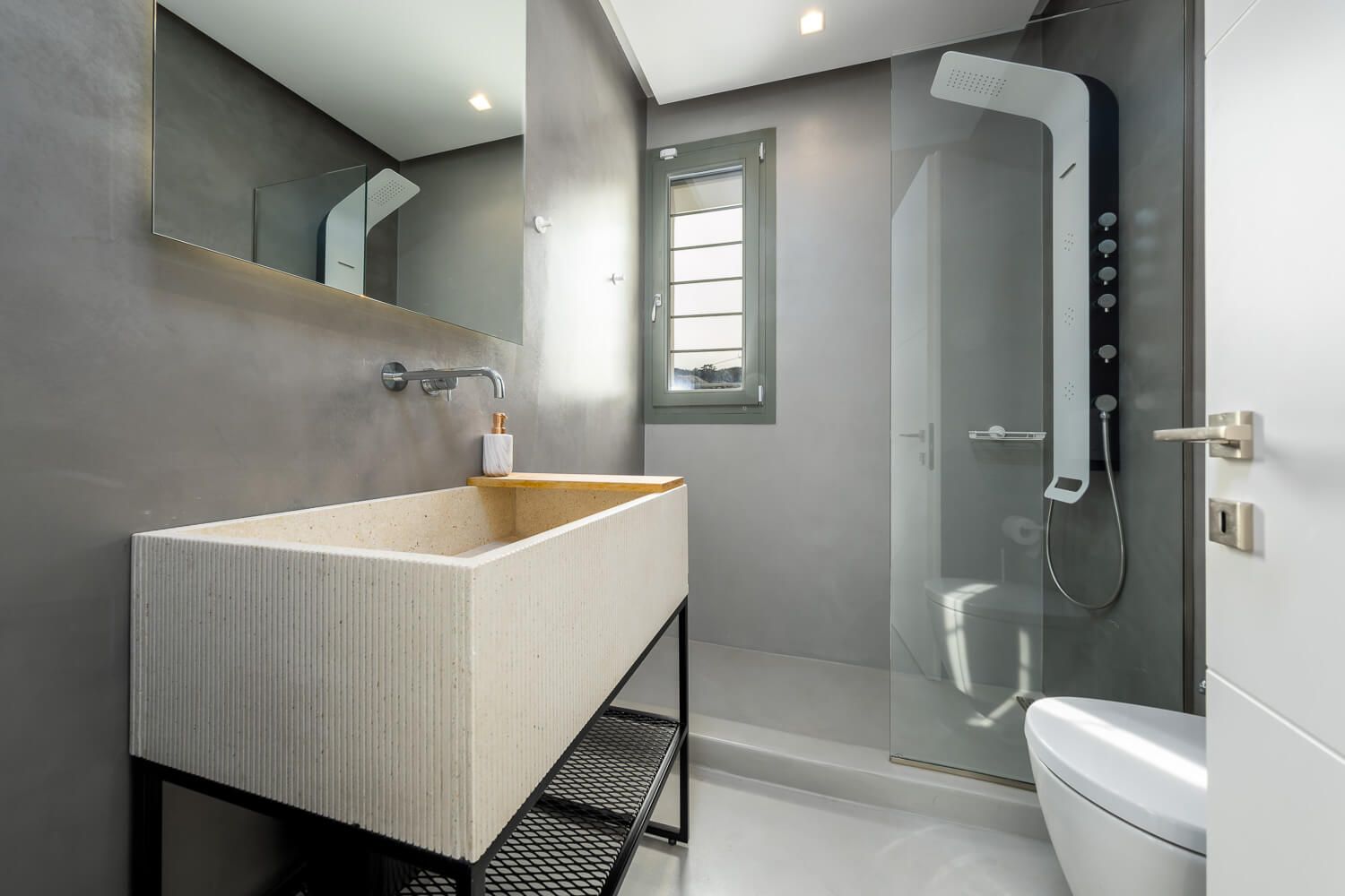 Beautifully styled bathroom with high-quality modern finishes from a luxury villa in Paros