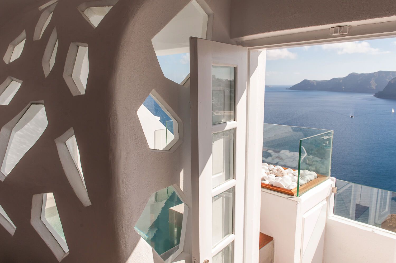 Minimalist outdoor aesthetic defining the Cycladic hospitality experience