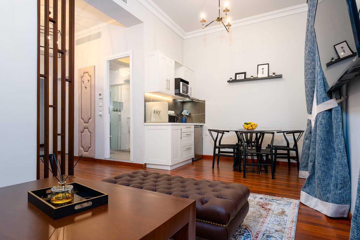 Clean lines and warm lighting in a neoclassical hotel suite