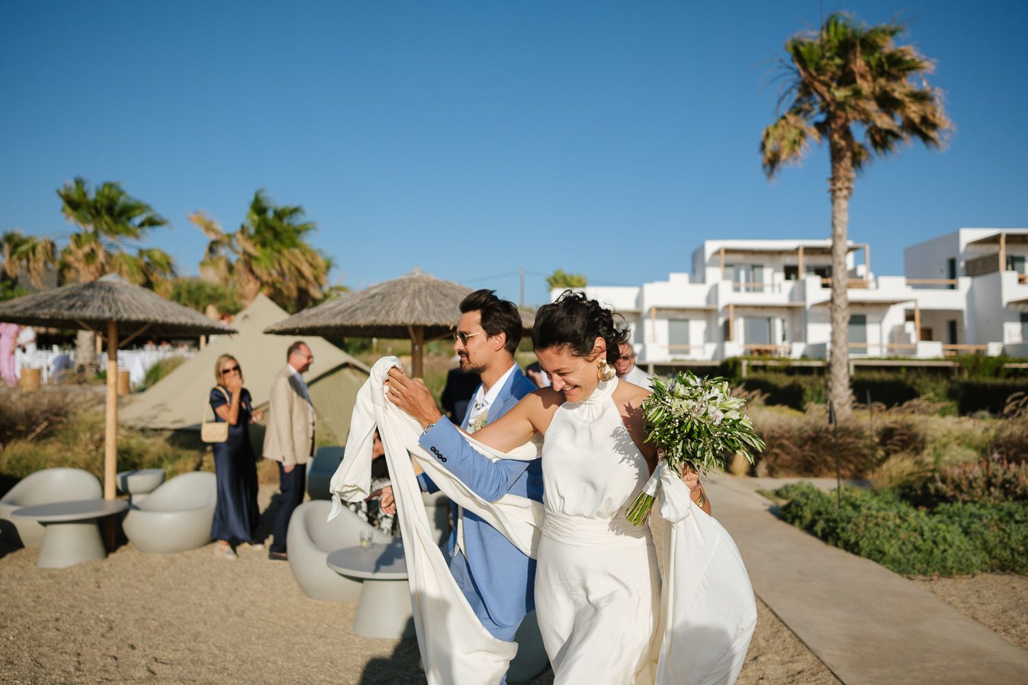 Unposed moments of bride and groom in the Cyclades