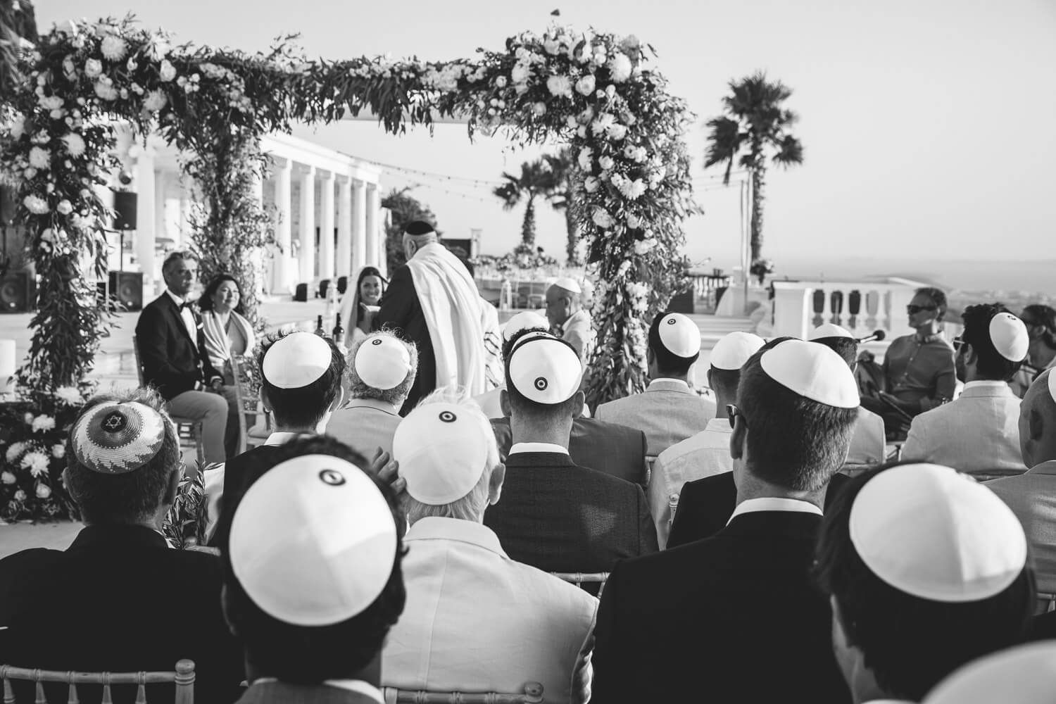 Wedding ceremony under the Chuppah with Aegean sea view in Paros