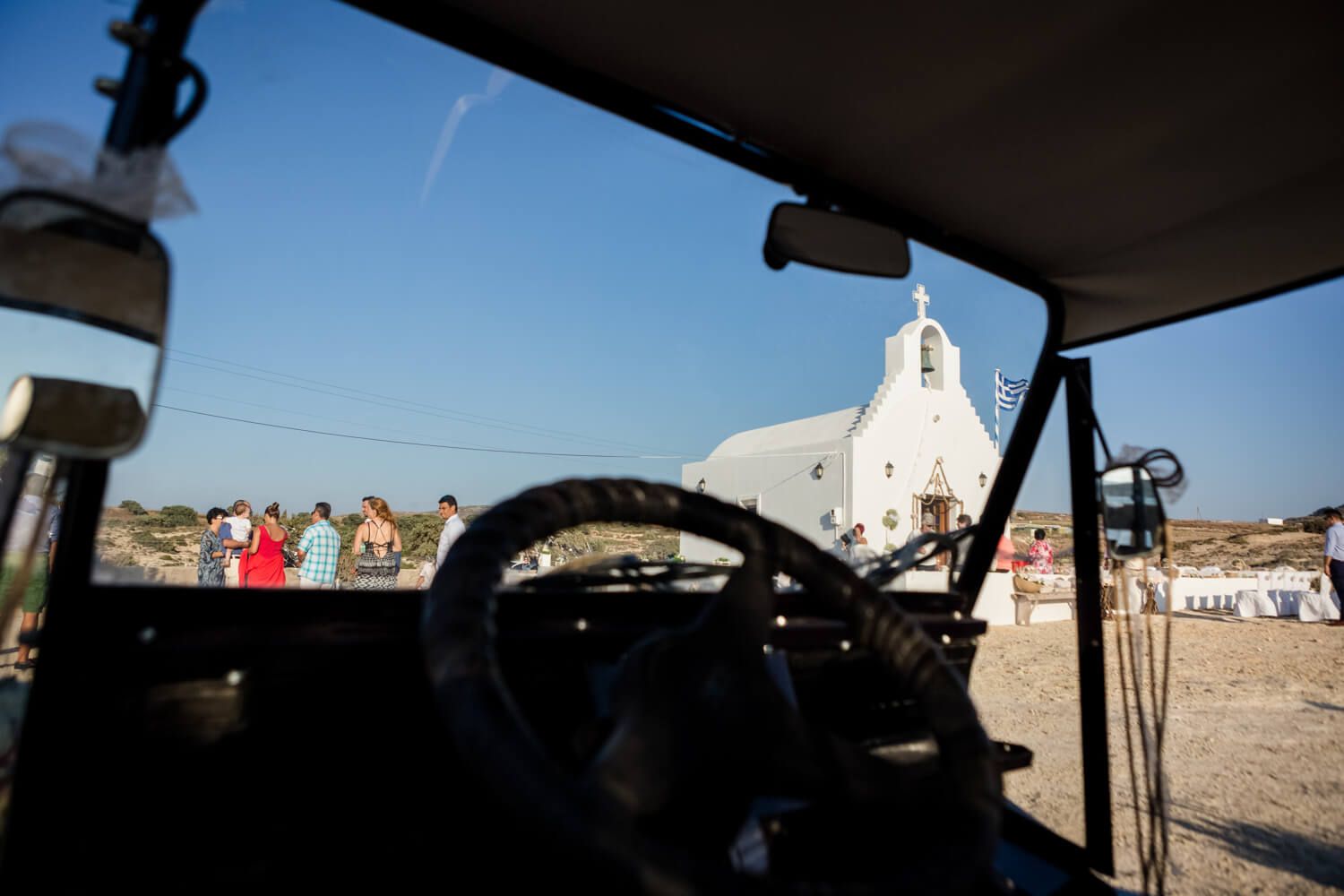 Wedding ceremony at Agios Konstantinos church by the sea in Milos