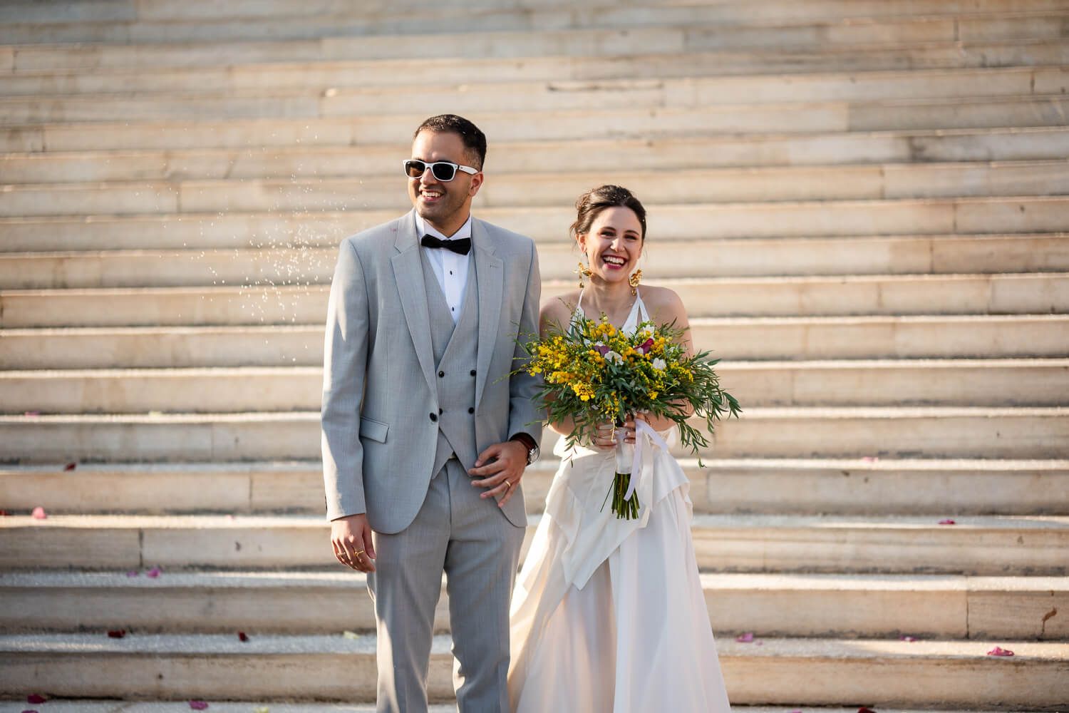 Happy newlyweds smiling after their Town Hall wedding in Syros