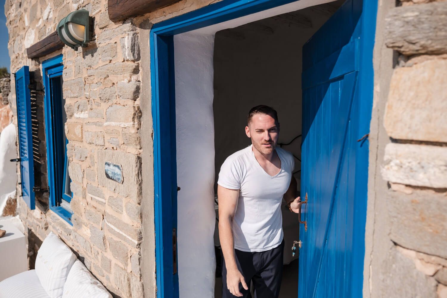 Groom Cody getting ready for his private villa wedding in Paros