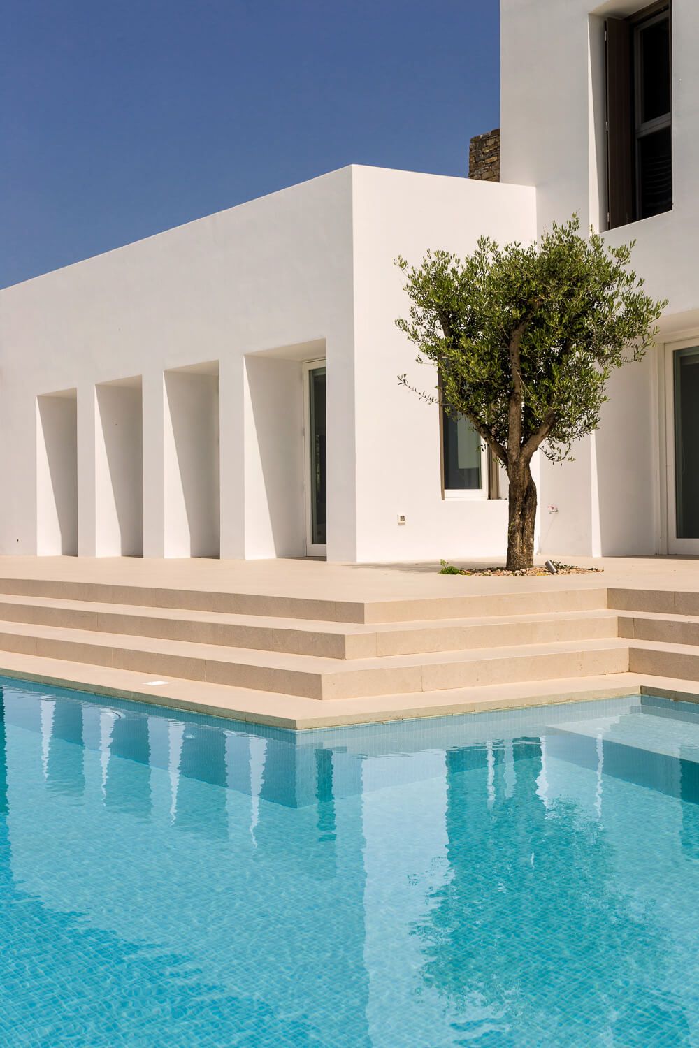 Real estate media showcasing a high-end island property in Paros