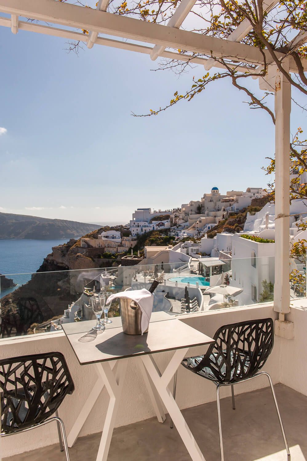 Sun-drenched private terrace offering spectacular Aegean Sea panoramas