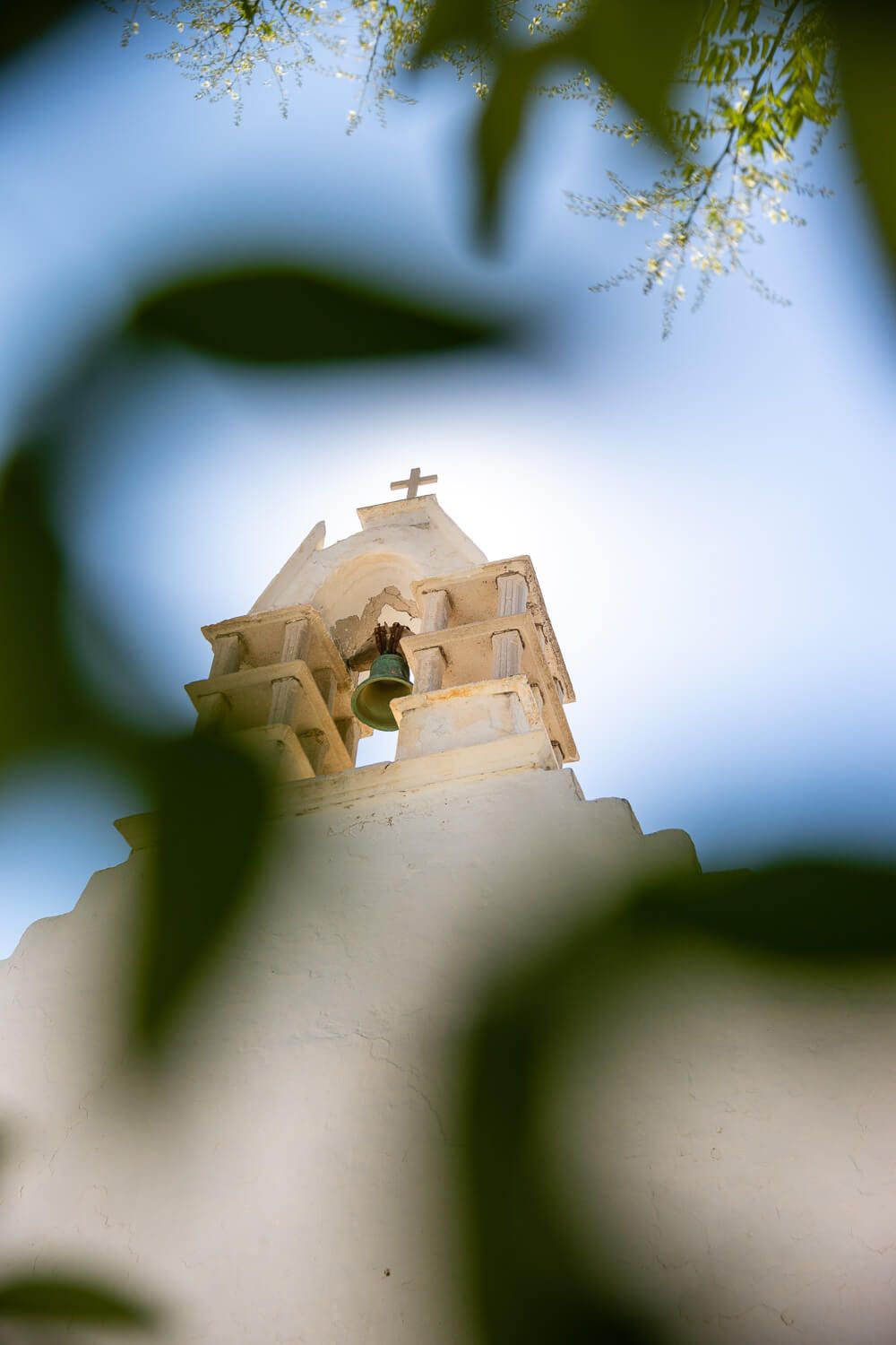 Exterior view of the historic Catholic church in Paros decorated with wedding flowers