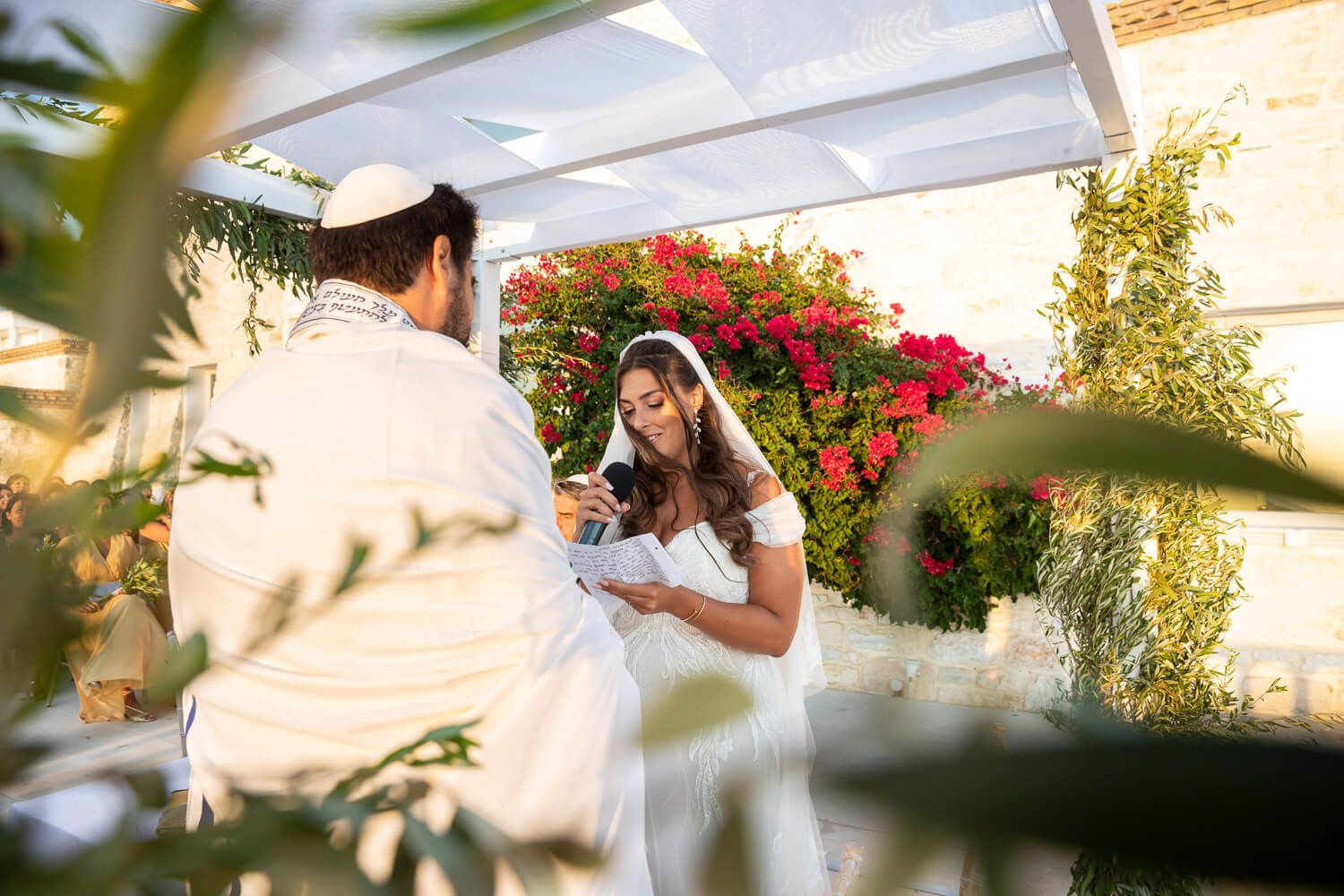 Exchange of rings during a traditional Jewish wedding in Paros