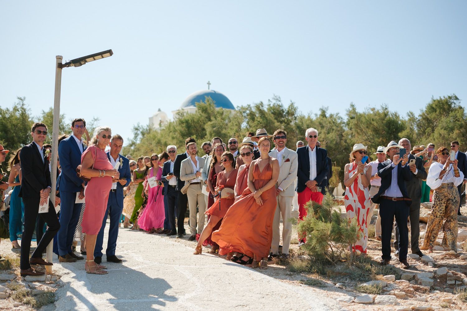 Guests waiting for the bride at Agios Fokas Chapel in Paros