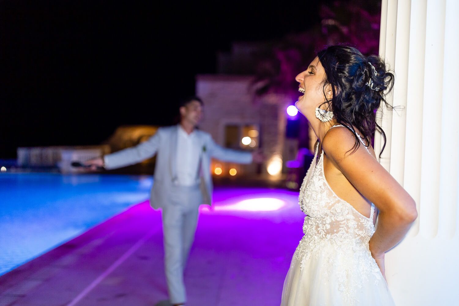 Newlyweds making their grand entrance to the dinner area at Villa Aethra
