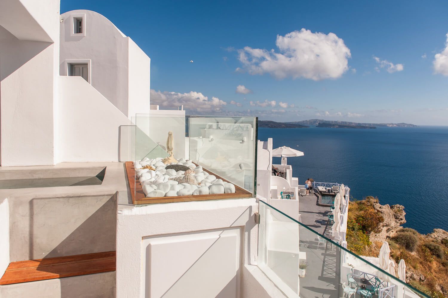 The pristine beauty of whitewashed cliffside accommodations