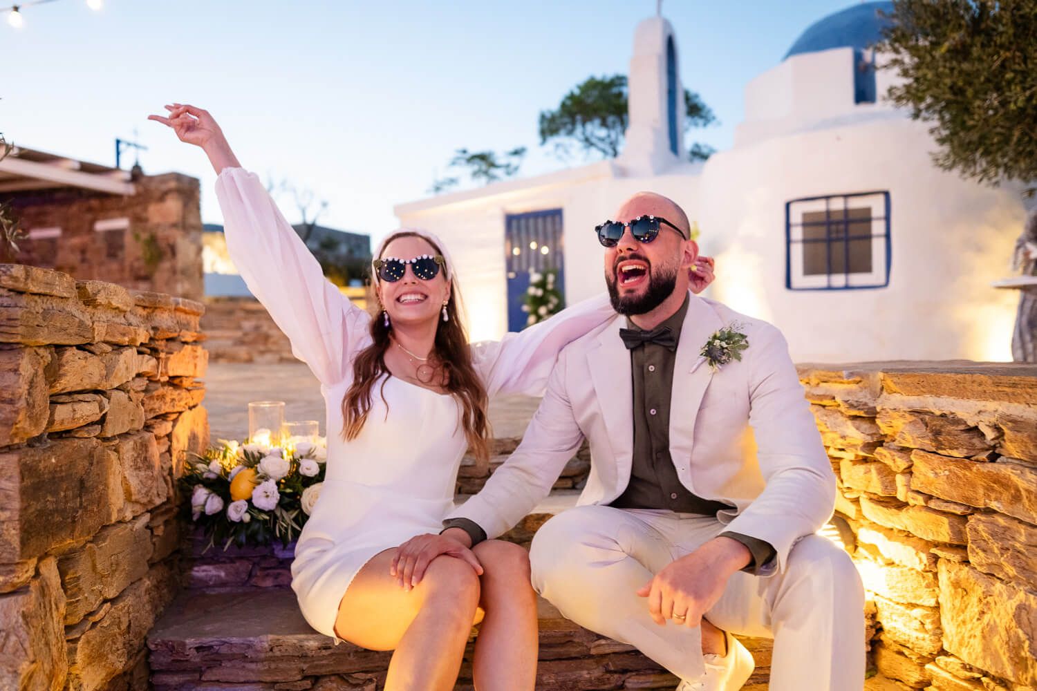 The newlyweds embracing under the shade of trees at The Secret View