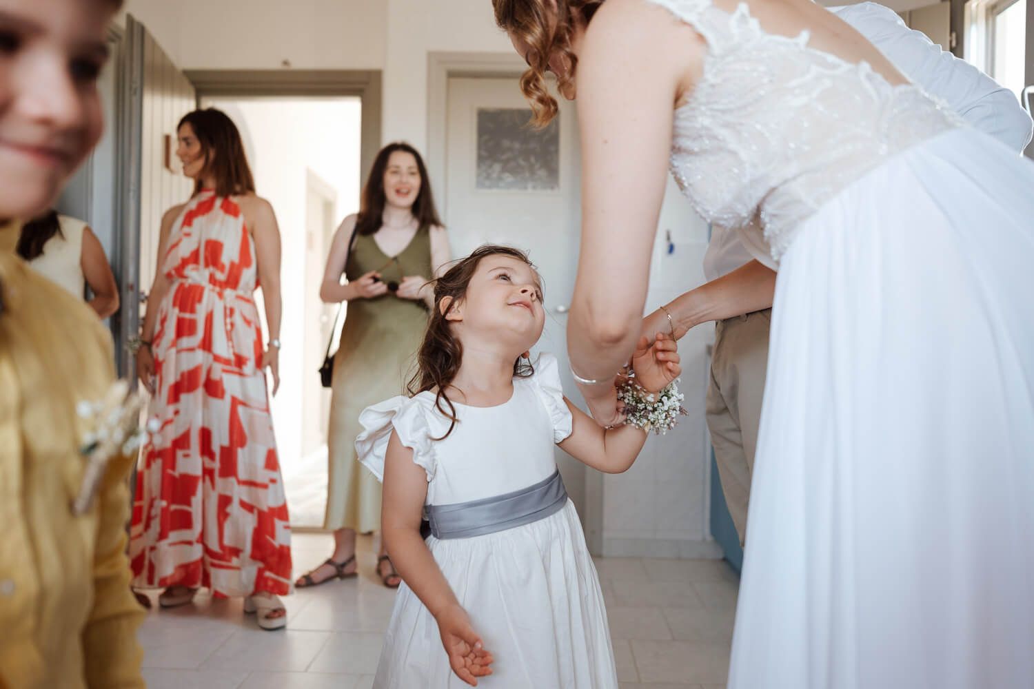Documentary wedding photography of bridal prep in Golden Beach Paros