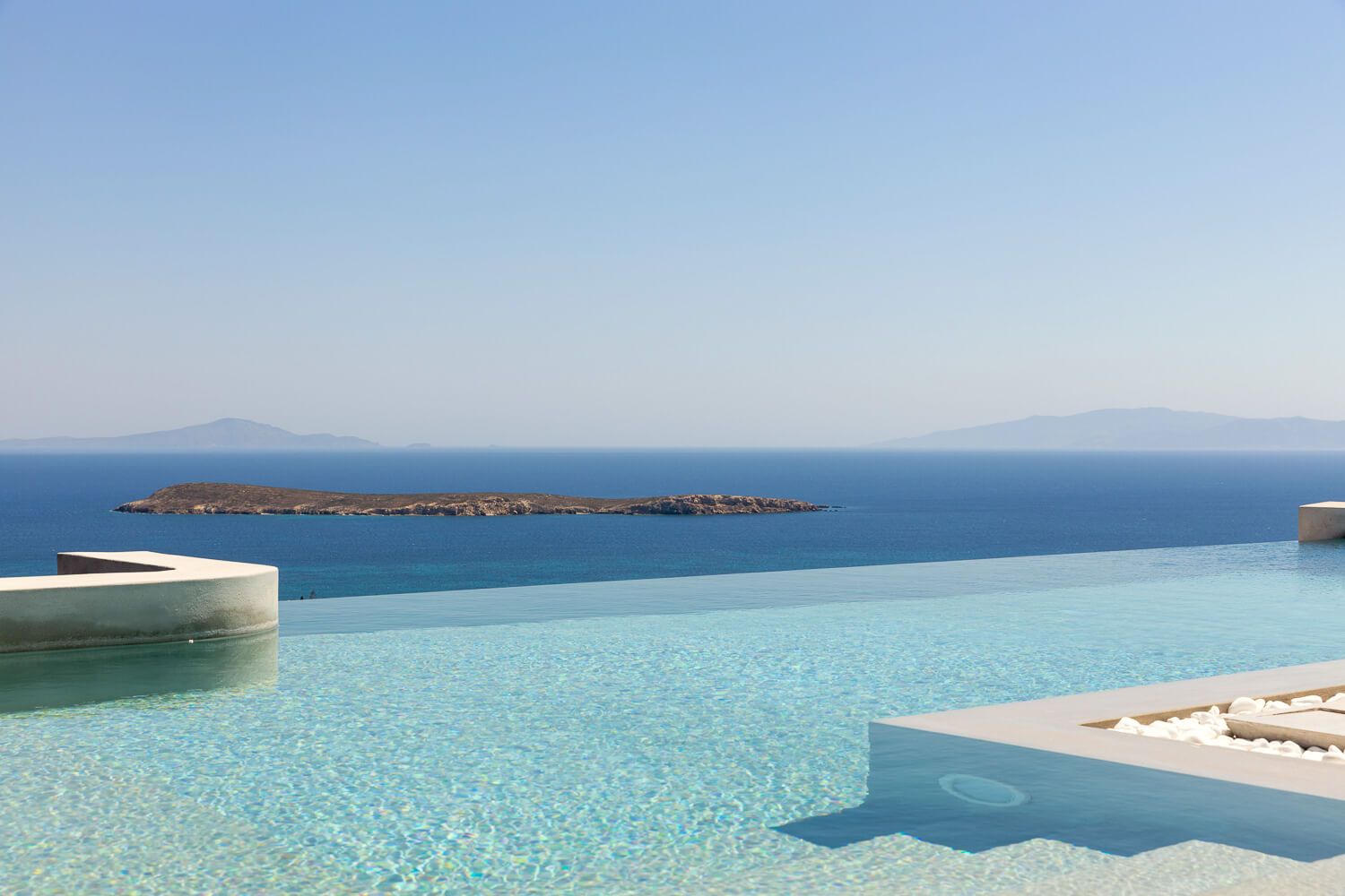 Sun-drenched private pool with an amazing view to Naxos in a Cycladic residential complex