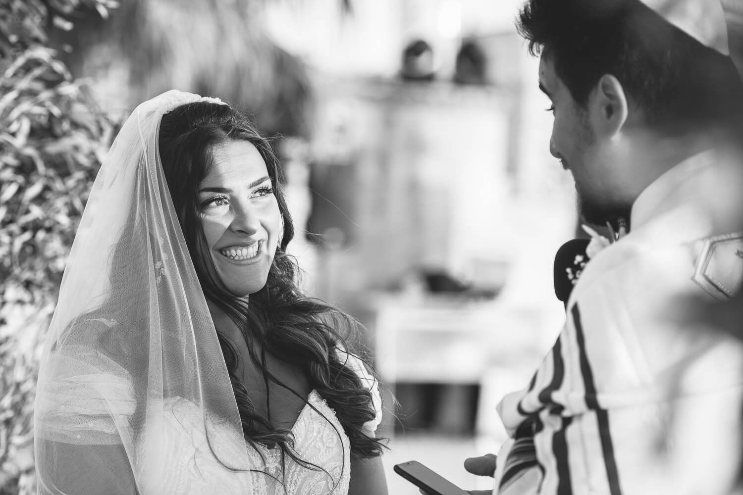 The bride and groom under the Talit during Paros Jewish ceremony