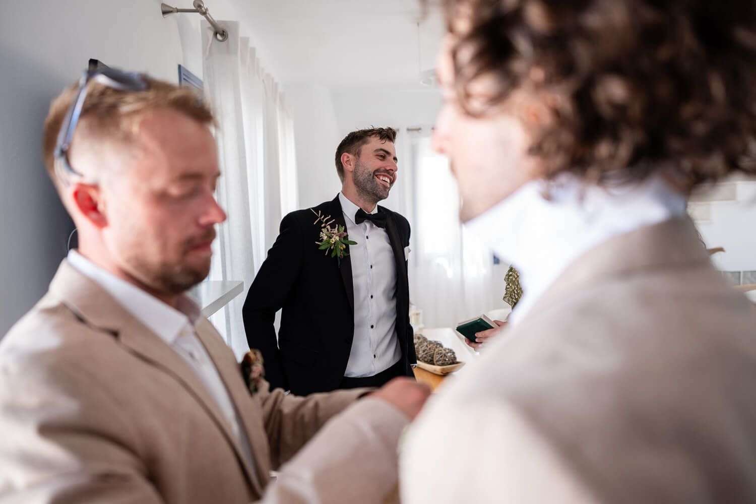 Groom getting ready before his wedding in Paros