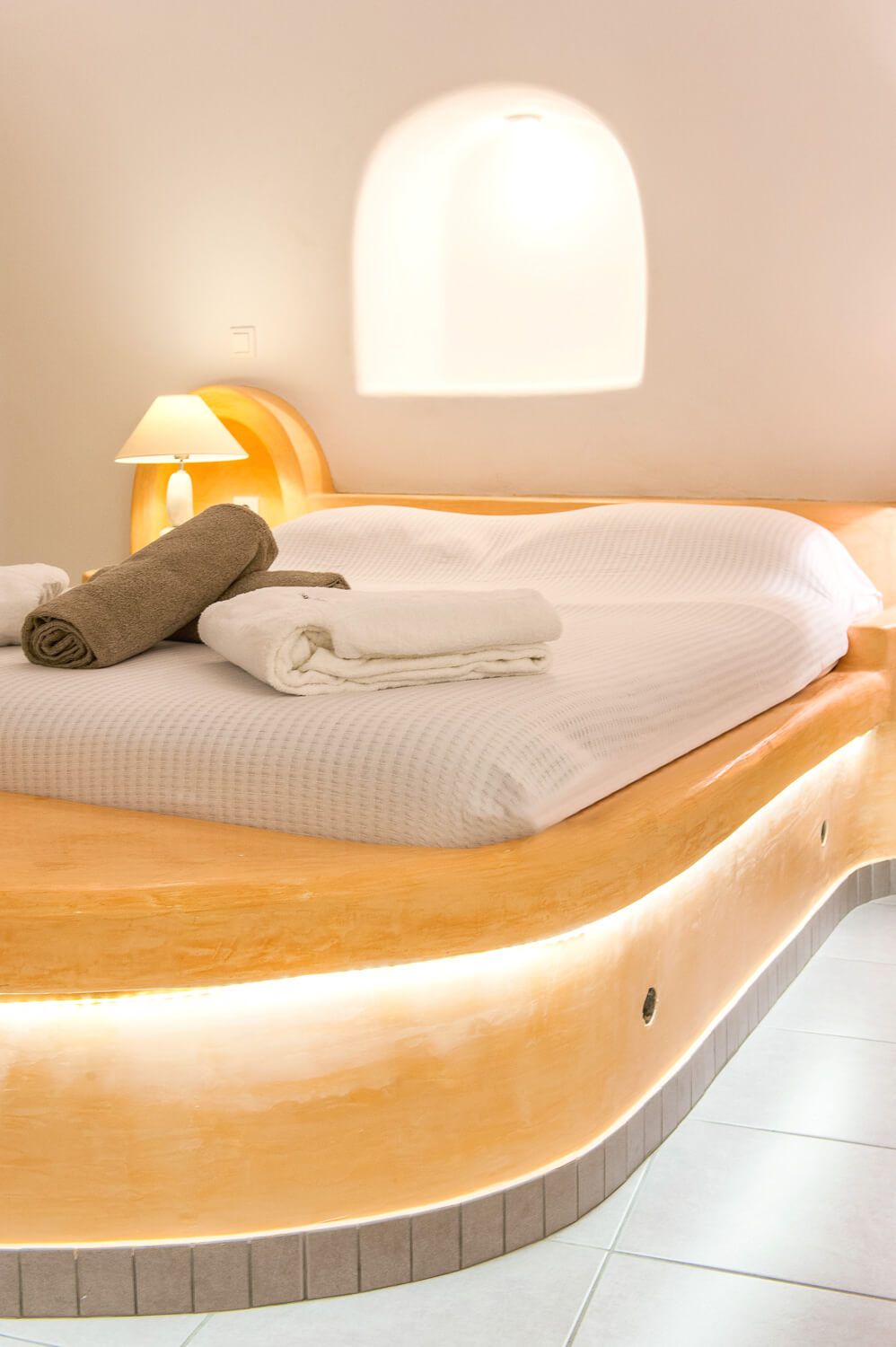 Sophisticated bedroom decor elevating the Cycladic hospitality experience