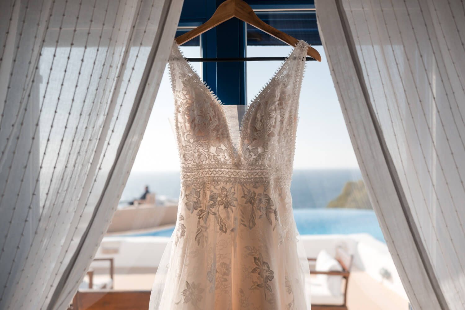 Elegant wedding dress hanging at Villa Lady of Paros Greece