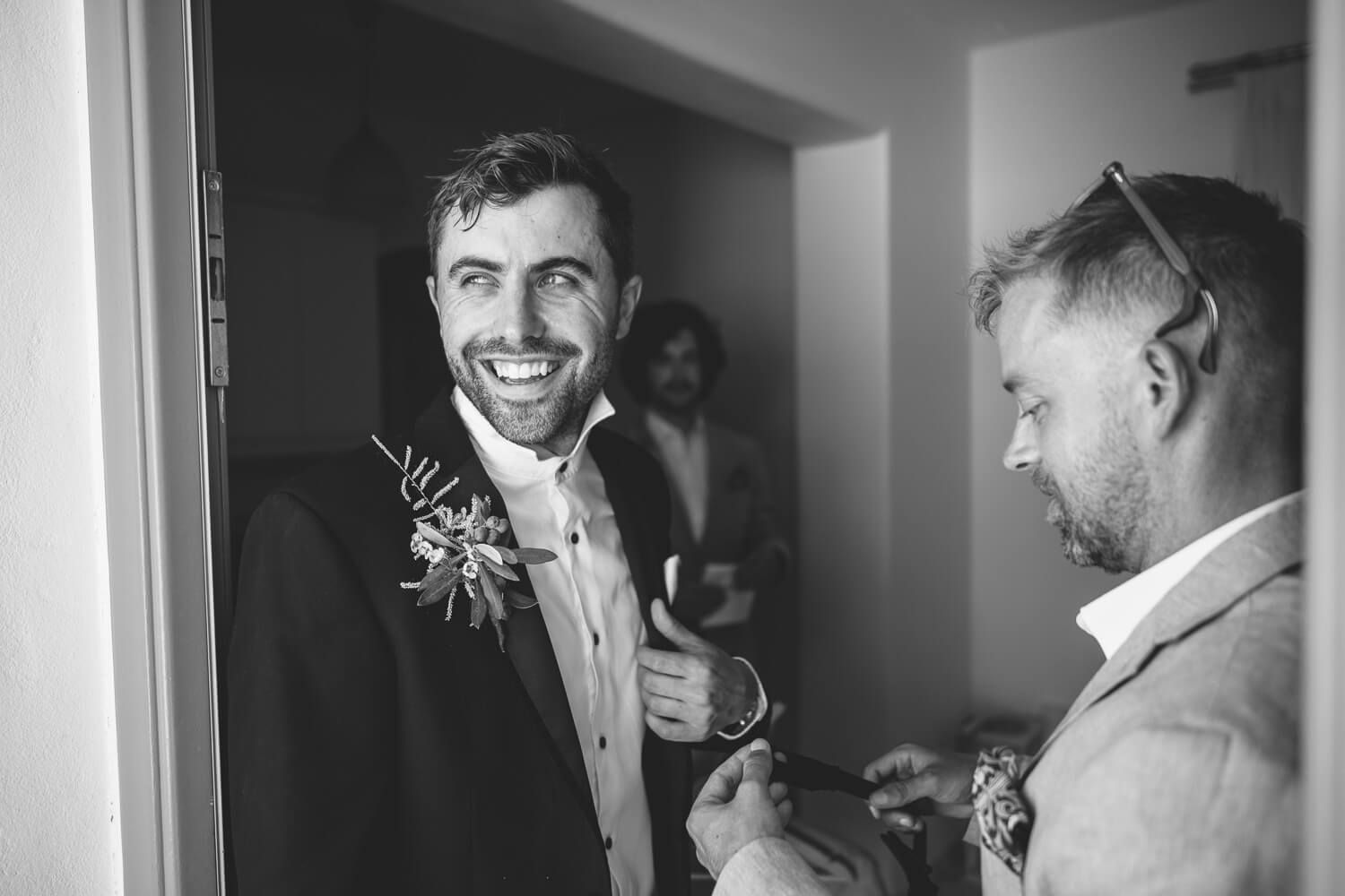 Groom getting ready before his wedding in Paros