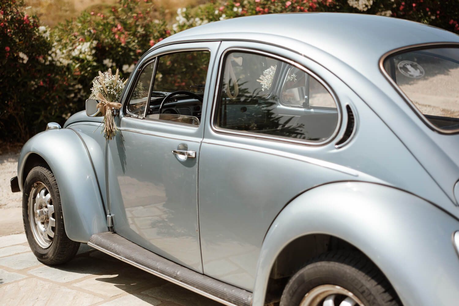 Vintage VW Beetle ready to drive the groom to Pyrgaki chapel