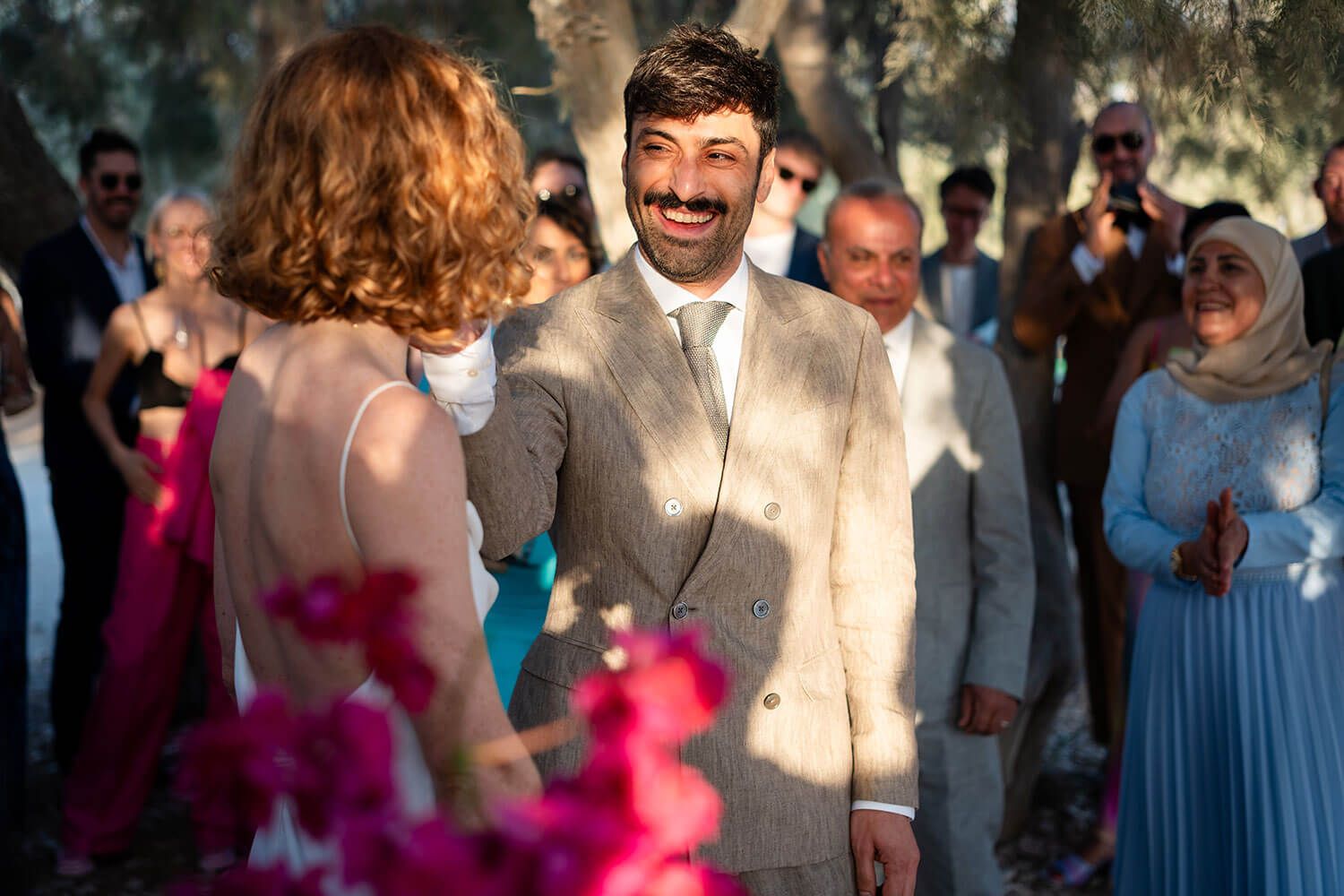 Emotional destination wedding ceremony on the coast of Aliki village