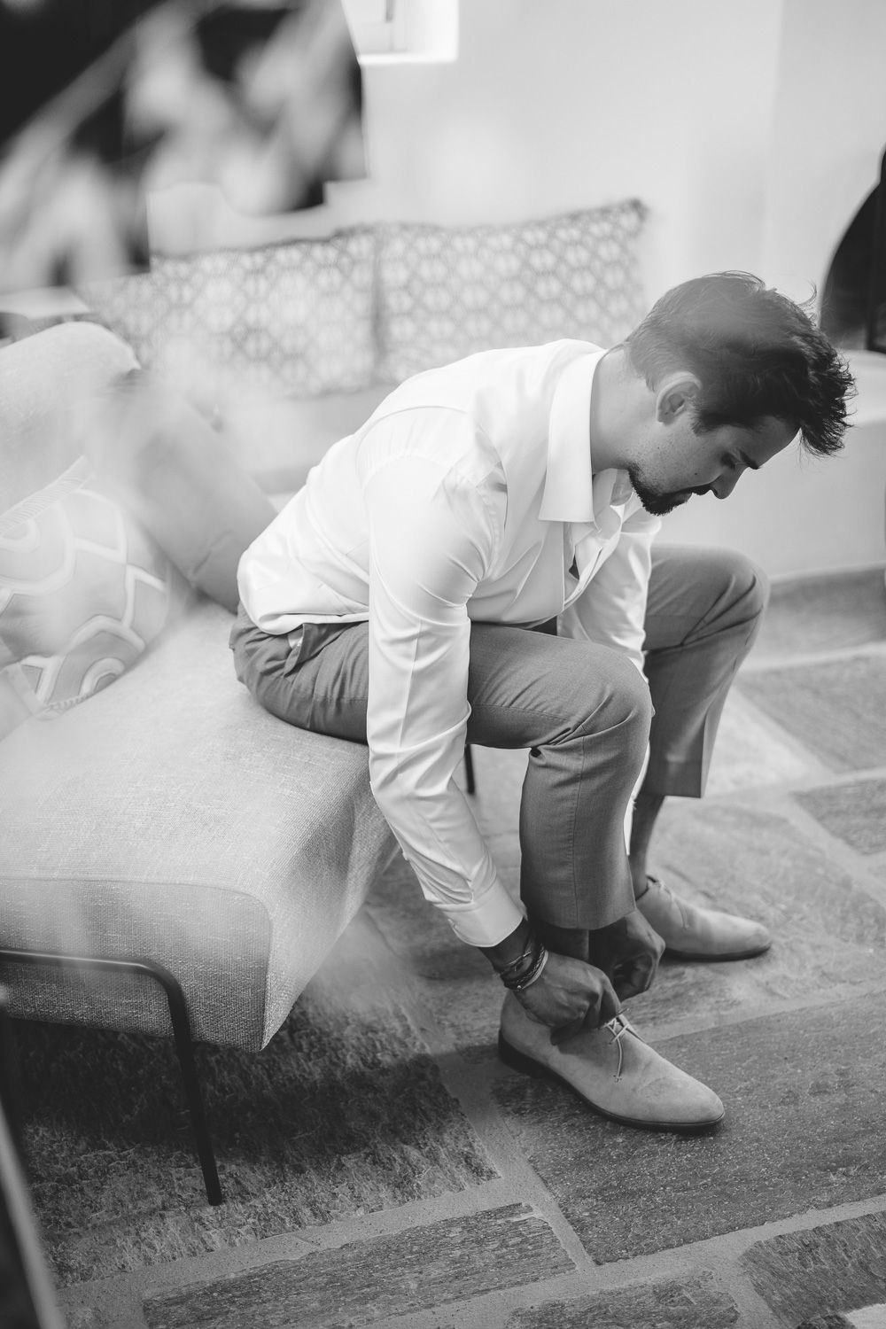 Unposed moments of groom in the Cyclades