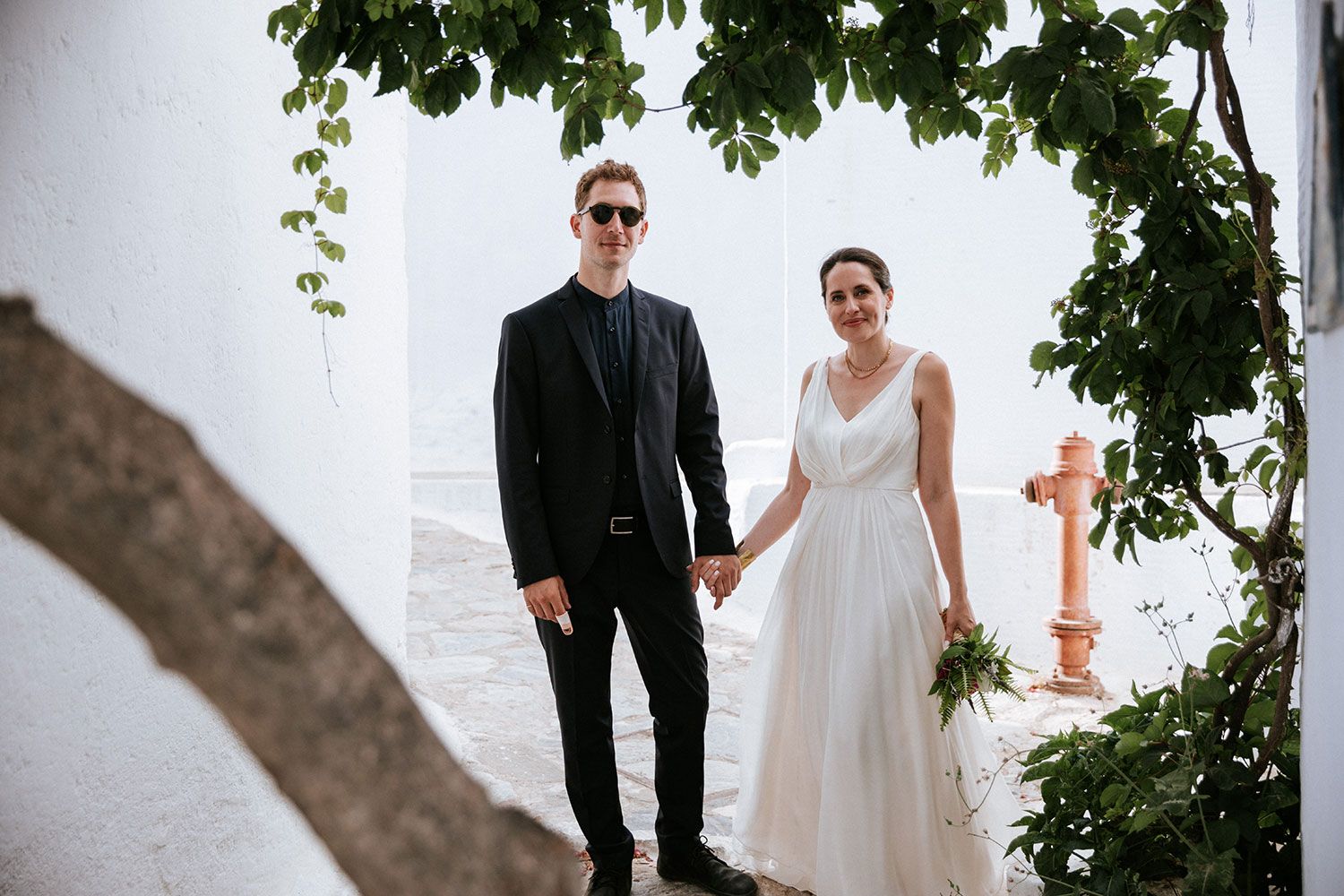Cinematic wedding photography in the deep blue of Amorgos