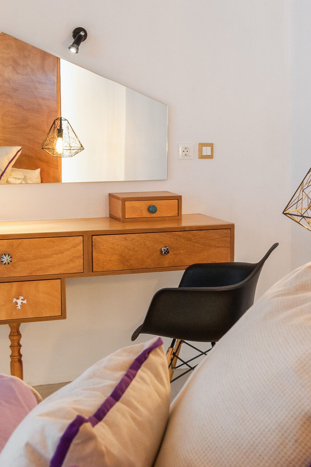 Detail shot of meticulous room styling and premium bedding