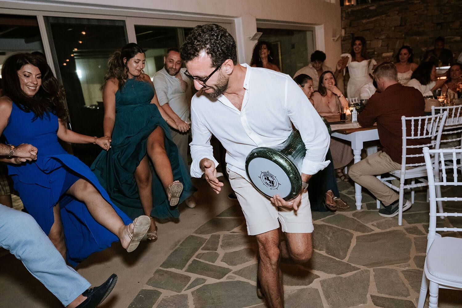Guests singing and celebrating love at an unforgettable island party