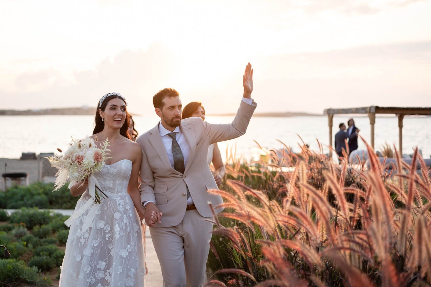 couple entering the venue during weddding reception at Seesoo Paros