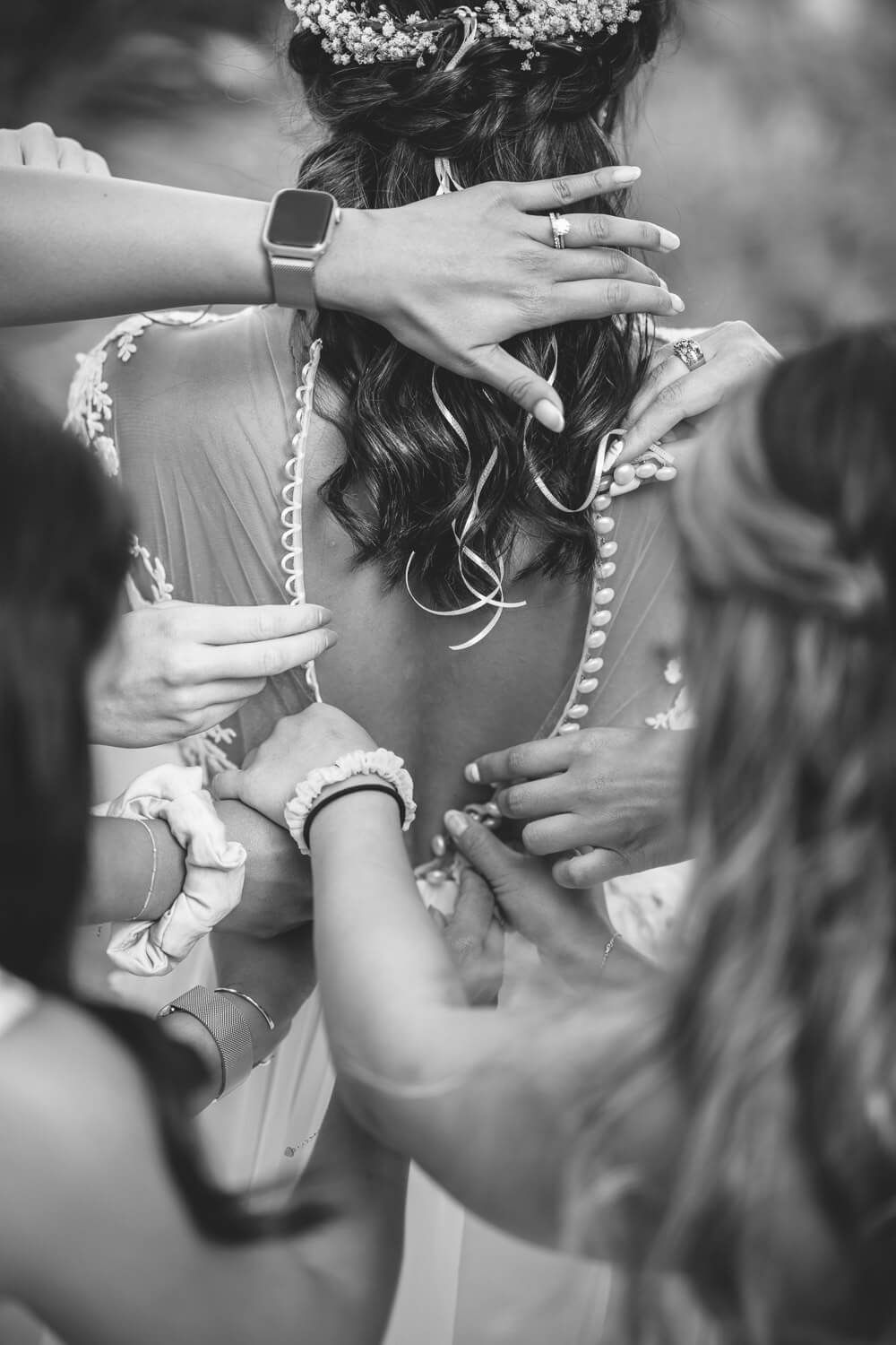 Bride with her mother and friends in traditional house
