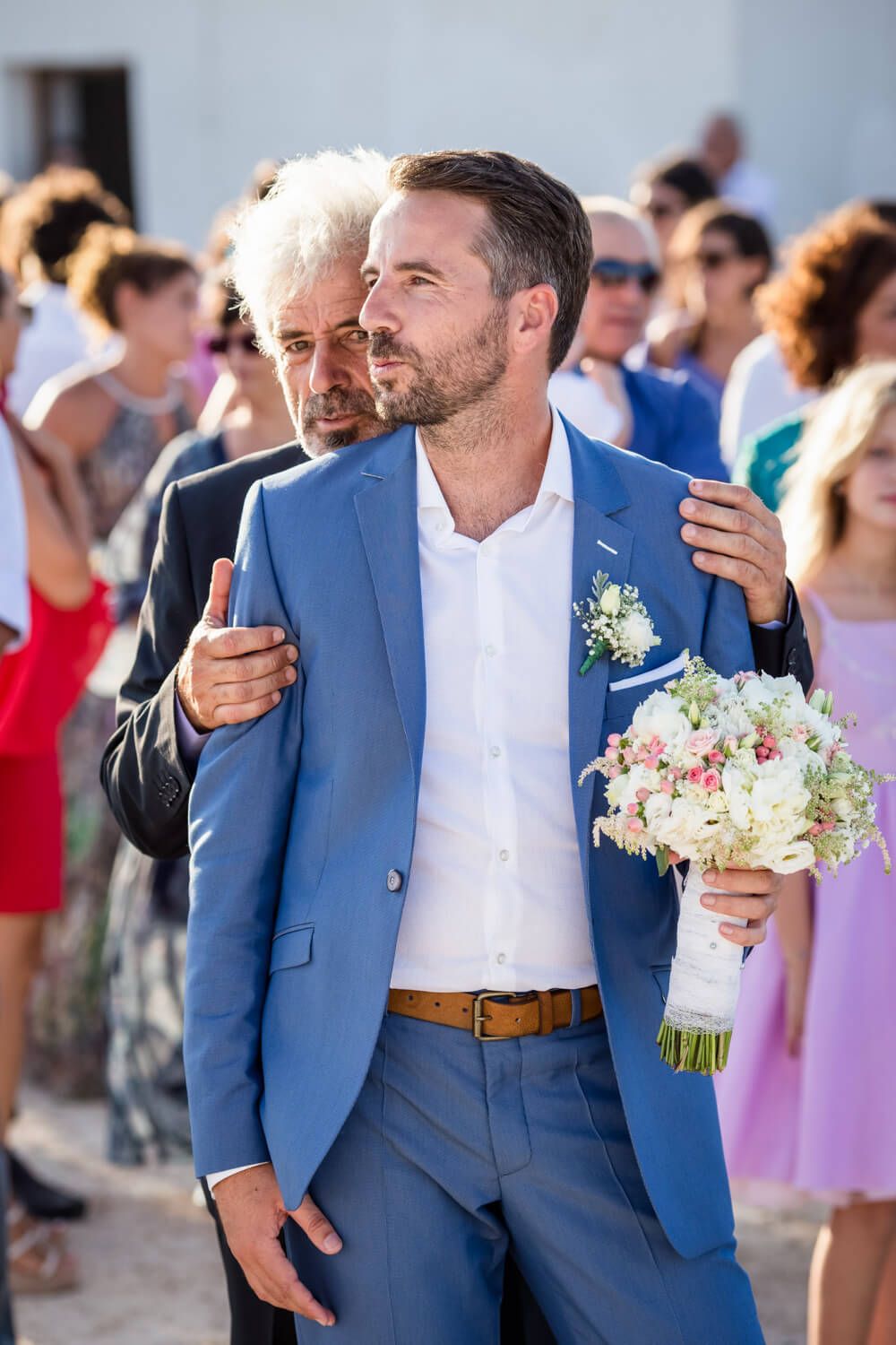 Gromm waiting for the bride at the chrch in Milos island