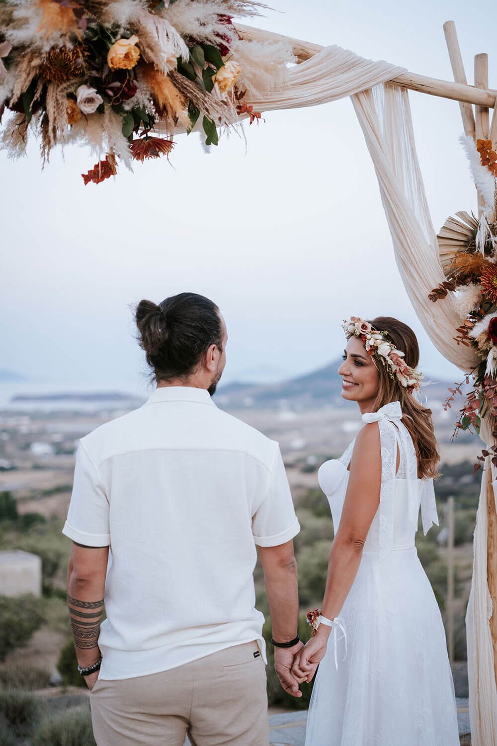Relaxed and carefree couple portraits at a boho destination wedding