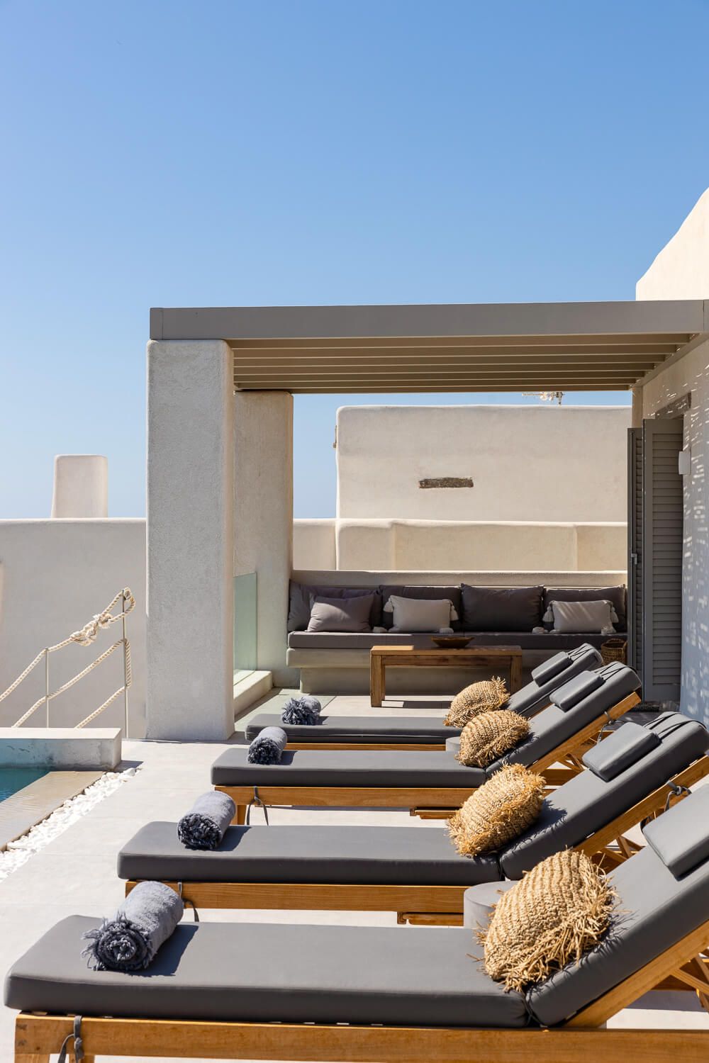 Paros real estate photographer captures details from an outdoor swimming pool area