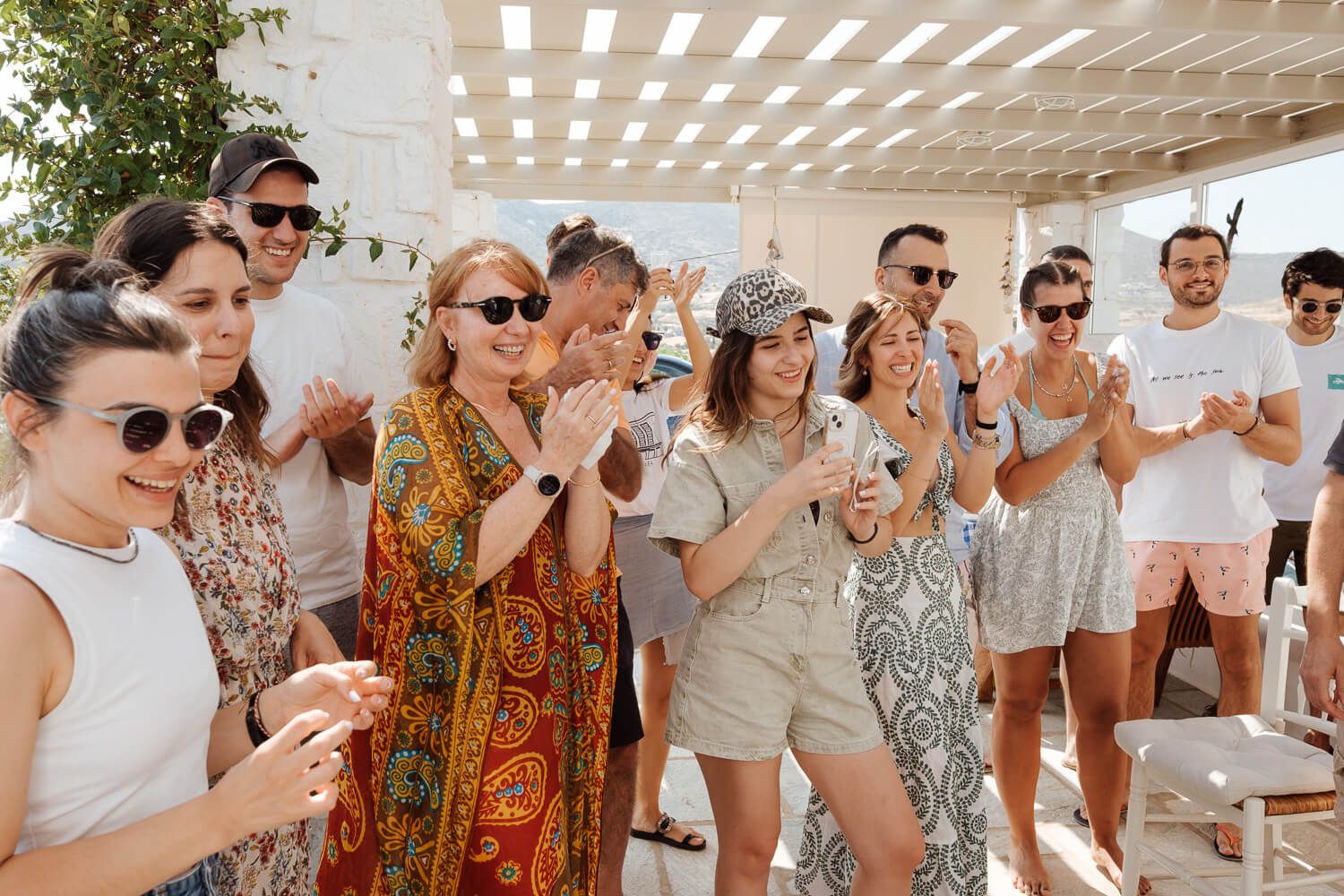 andid moments of the groom's guests in Golden Beach Paros
