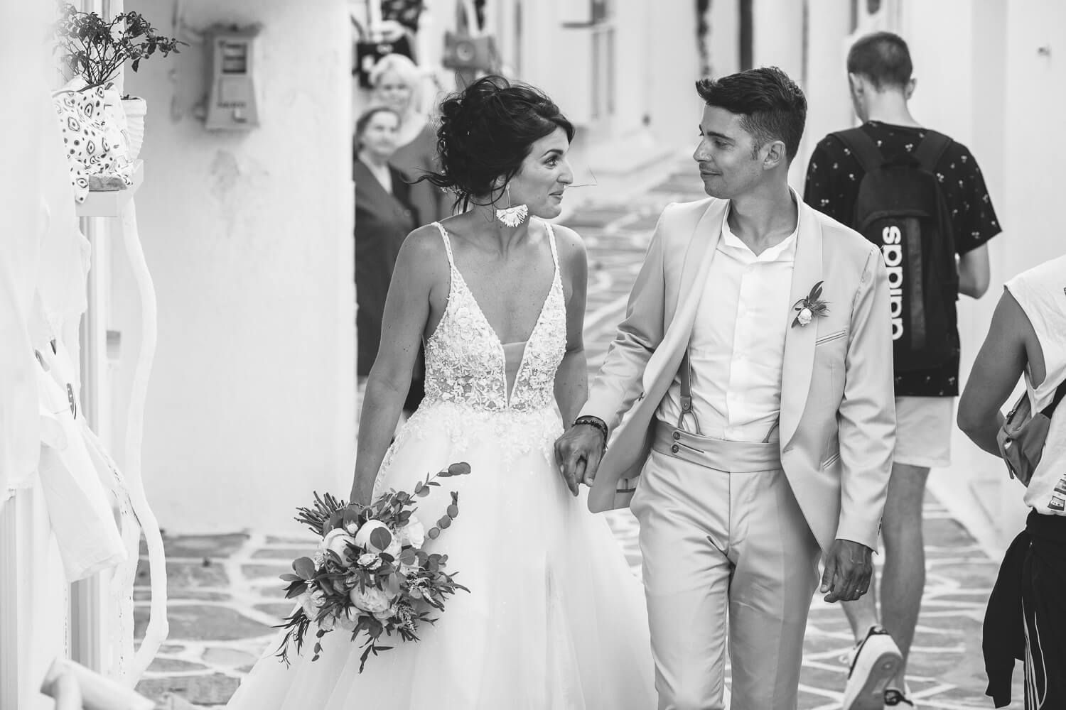 Romantic couple portraits in the stone-paved alleys of Parikia old town