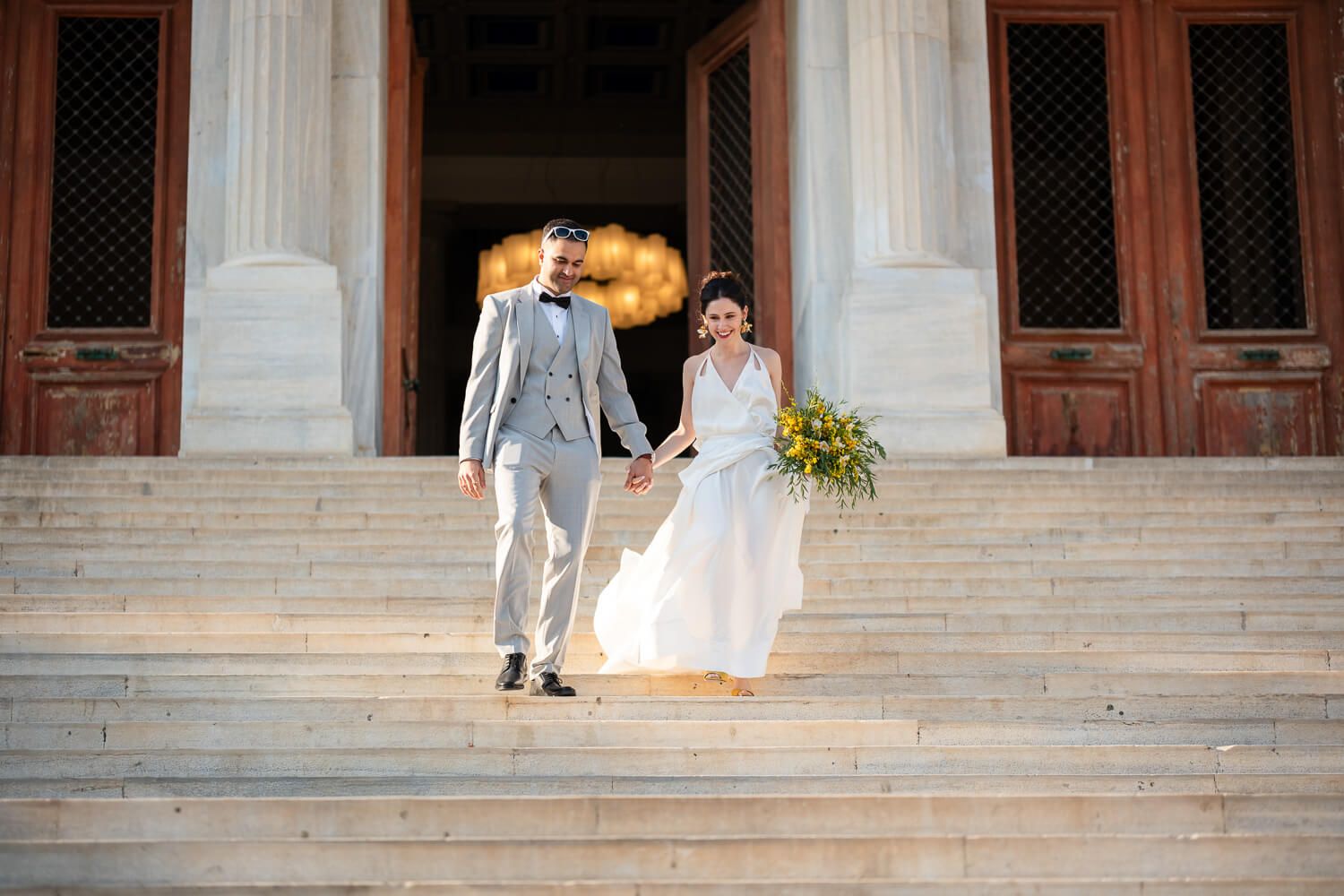 Happy newlyweds smiling after their Town Hall wedding in Syros