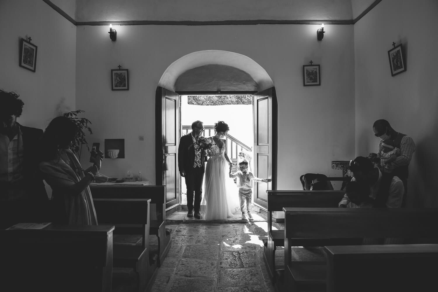 Emotional moment of the bride's father leading her down the aisle