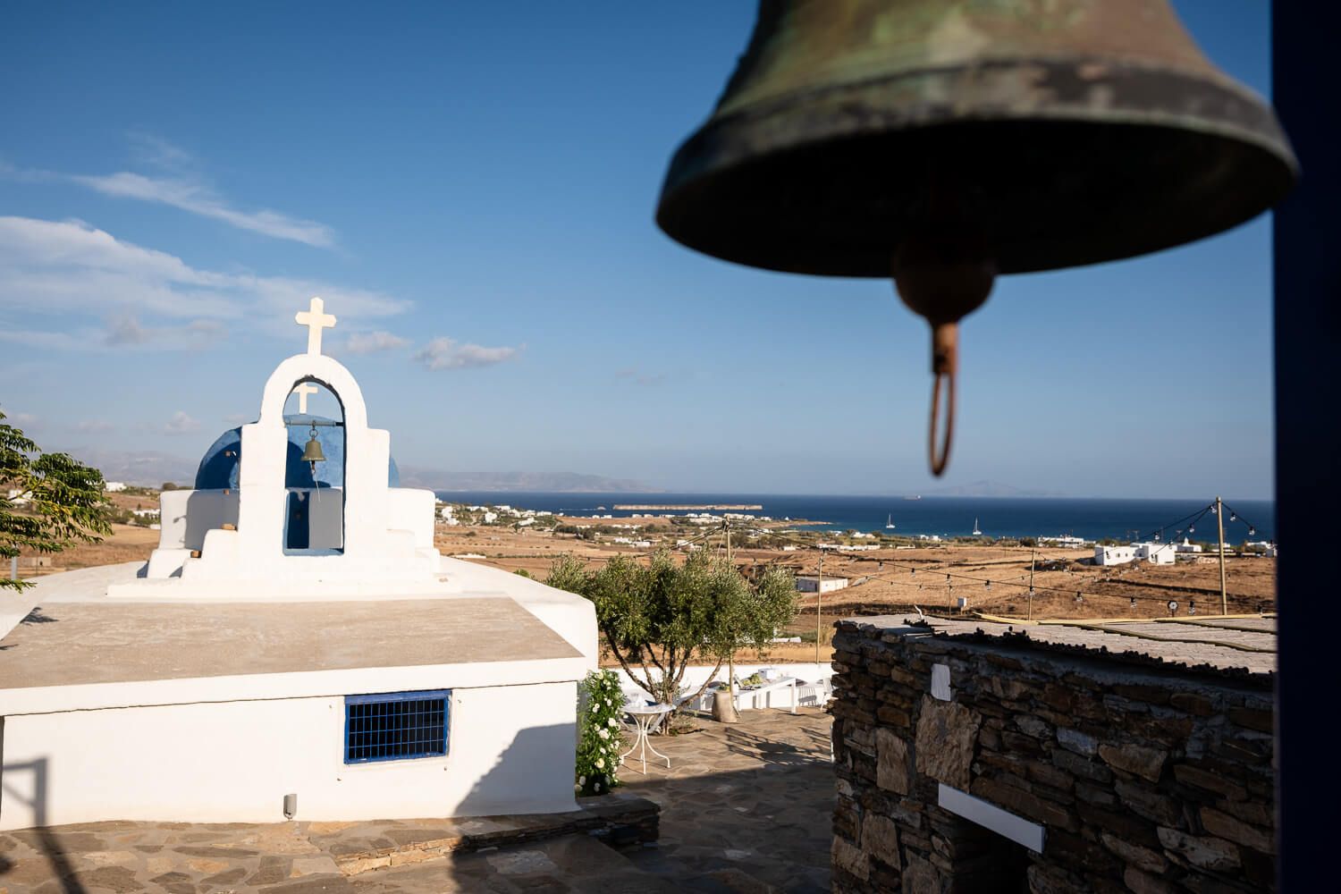 The traditional whitewashed Agia Marina chapel at The Secret View wedding venue