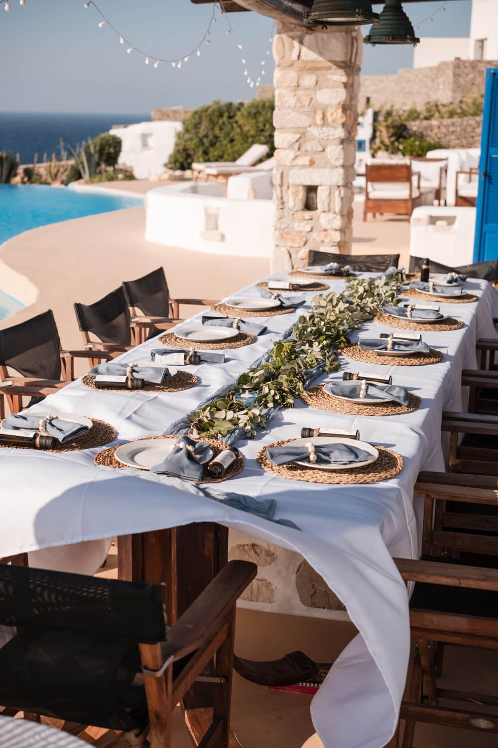 Elegant poolside wedding dinner setup at Villa Lady of Paros