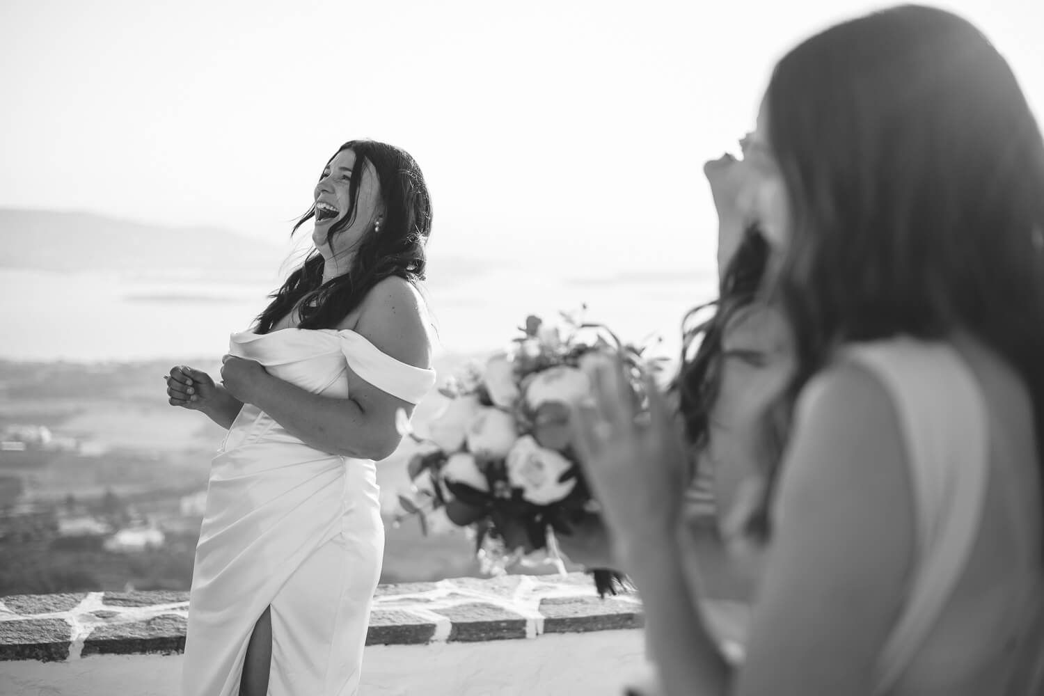 Exchange of wedding rings during hilltop ceremony in Paros