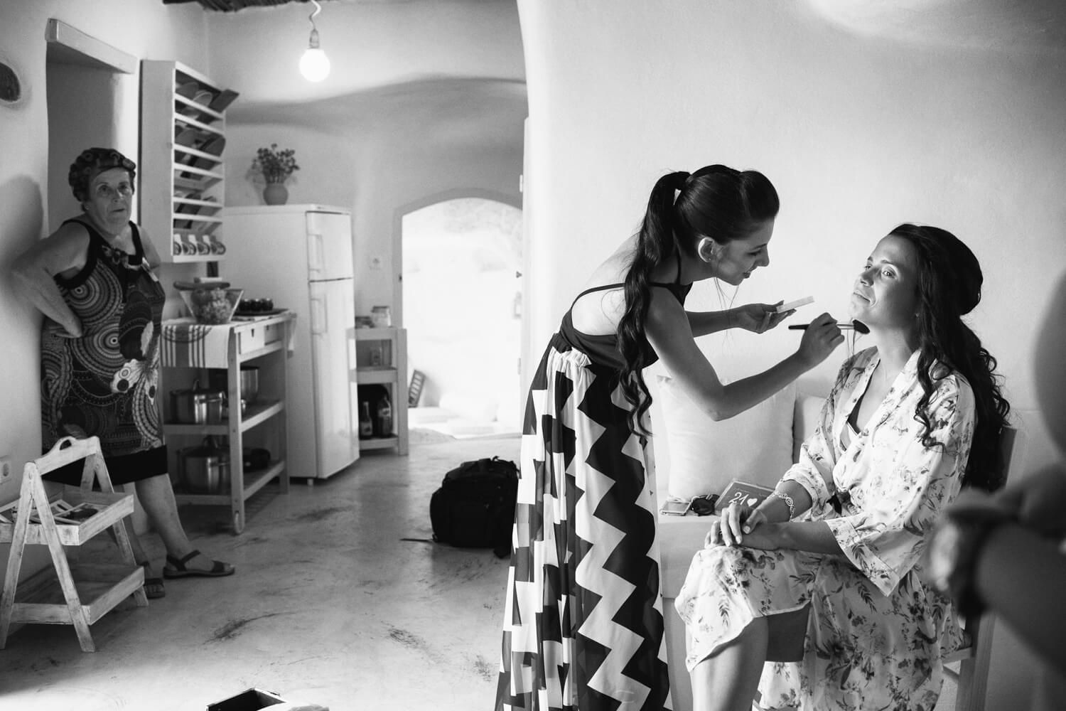Spanish bride with bridesmaids having fun during preparation