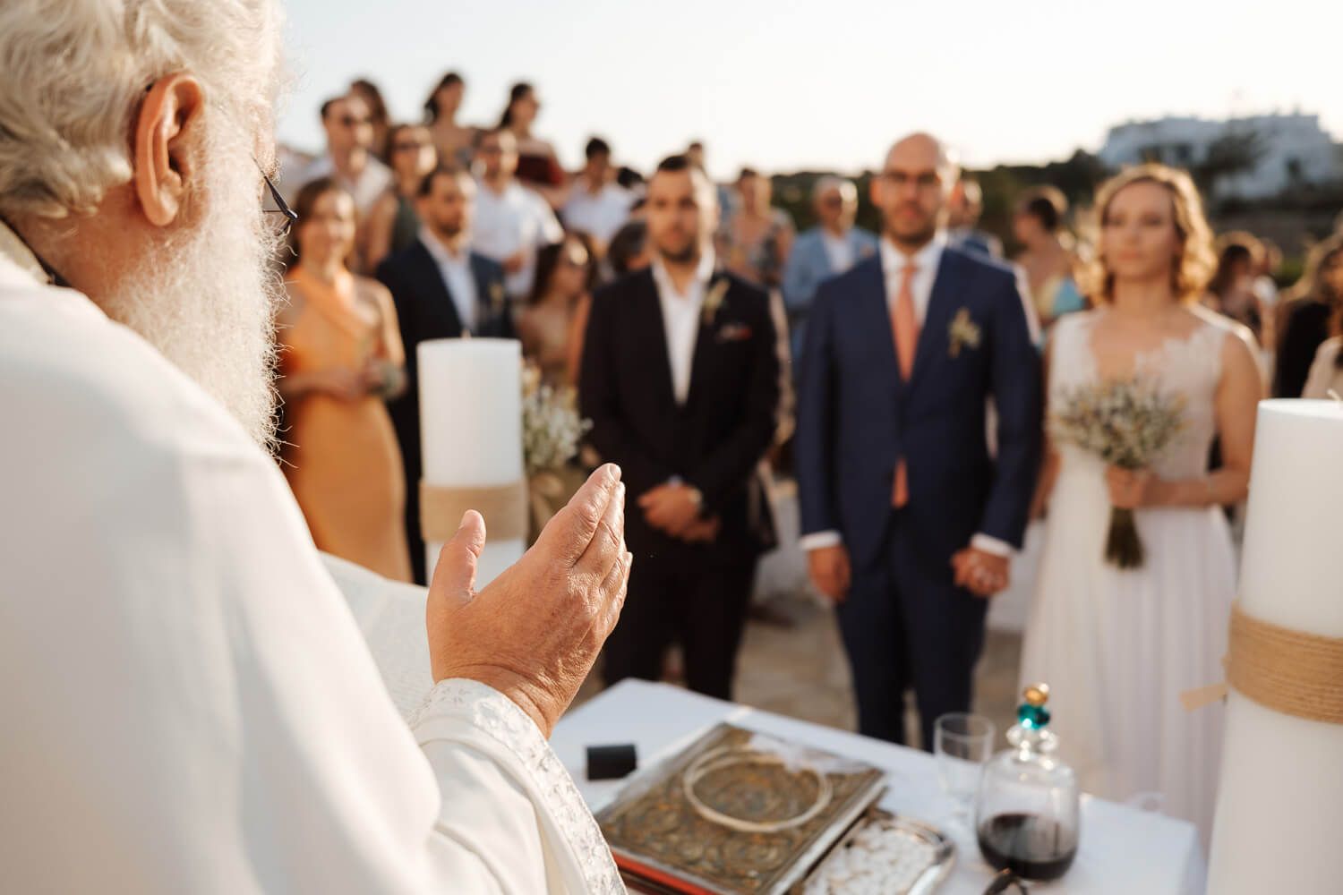 Close up of priest's hand blessing the couple during an Orthodox ceremony