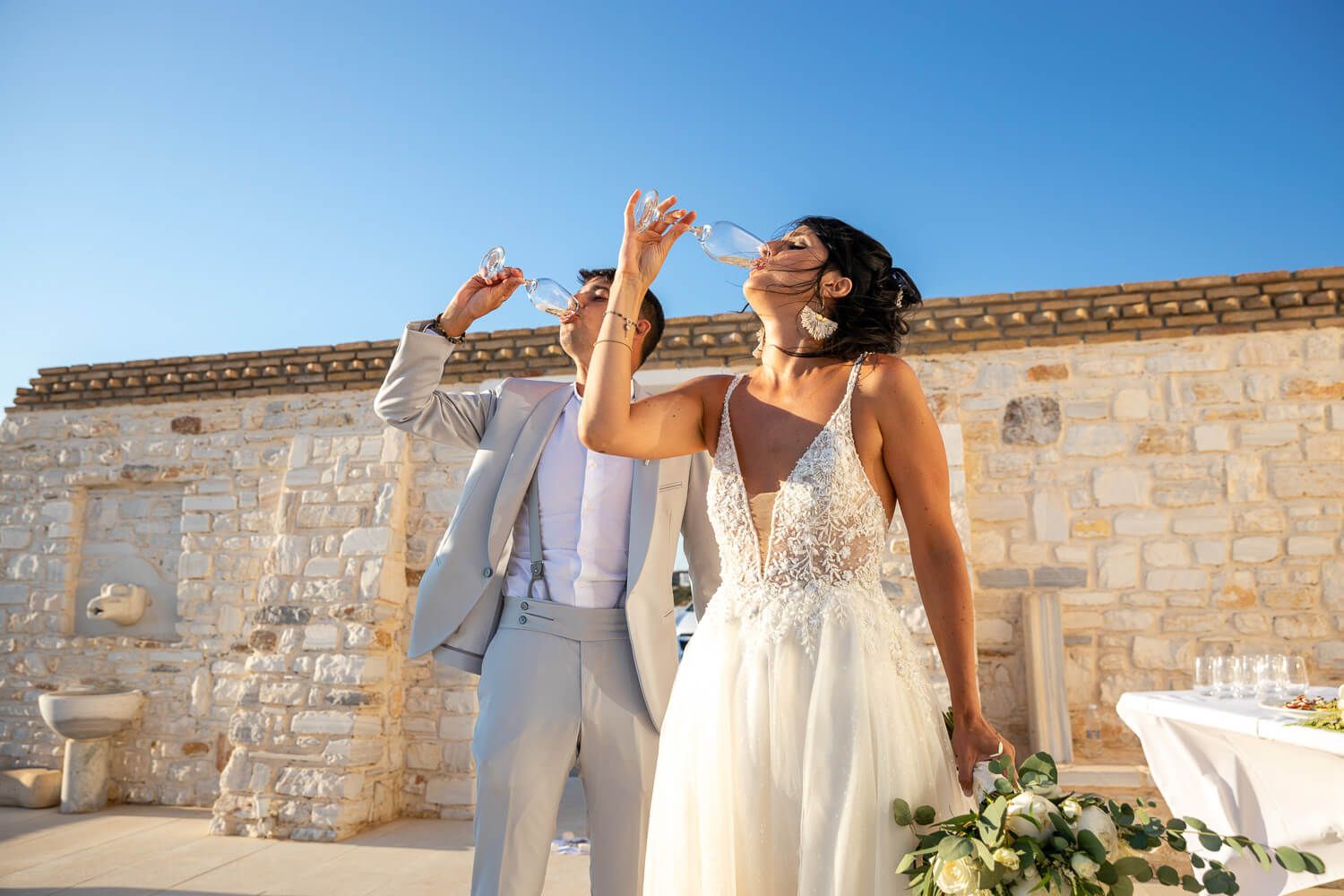 Newlyweds making their grand entrance to the dinner area at Villa Aethra