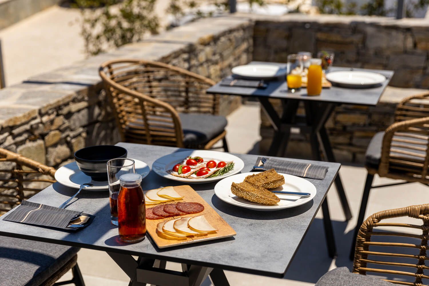 Relaxing exterior breakfast area within a boutique architectural project
