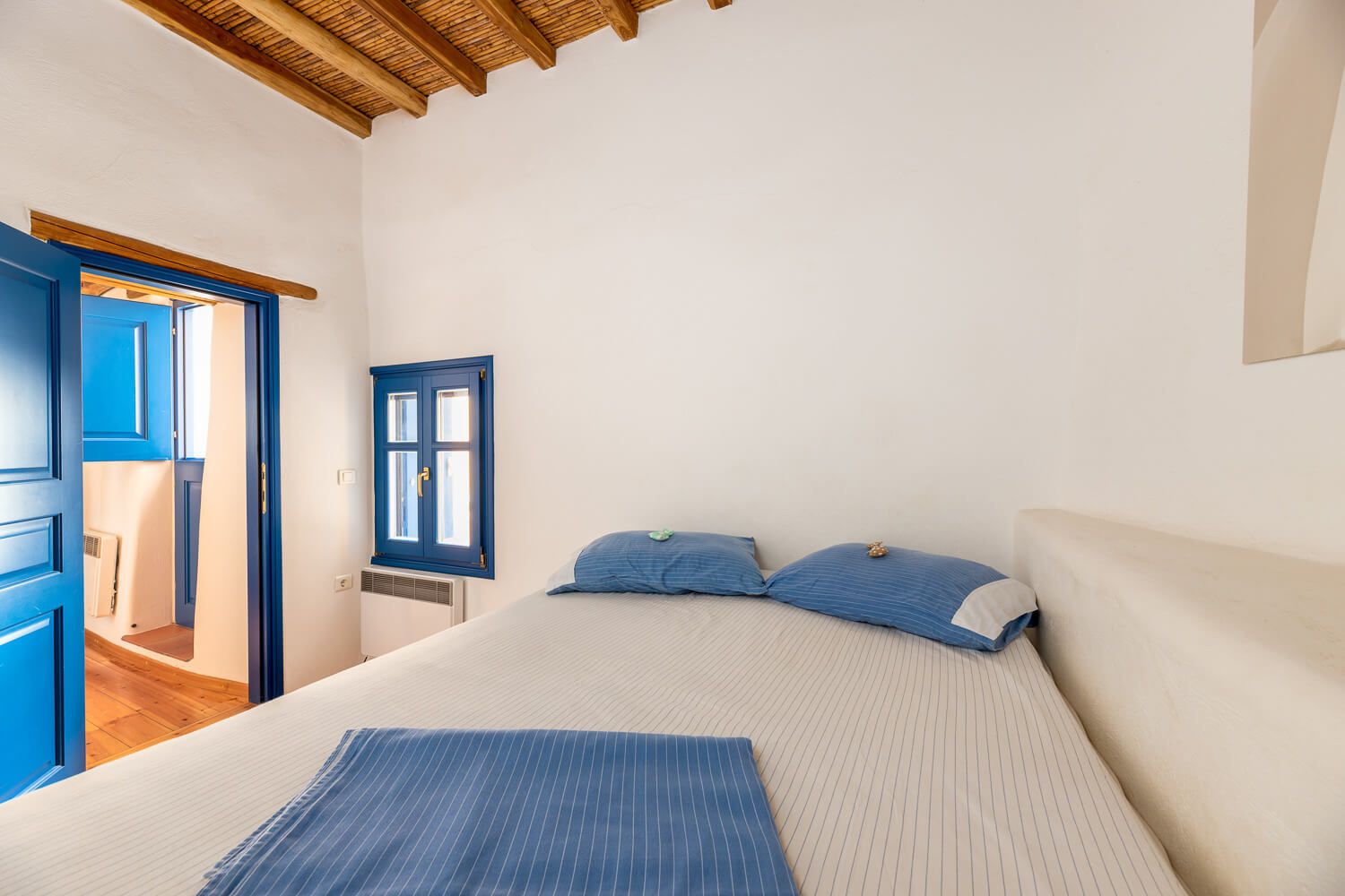 Architectural photography of a minimalist Cycladic indoor space