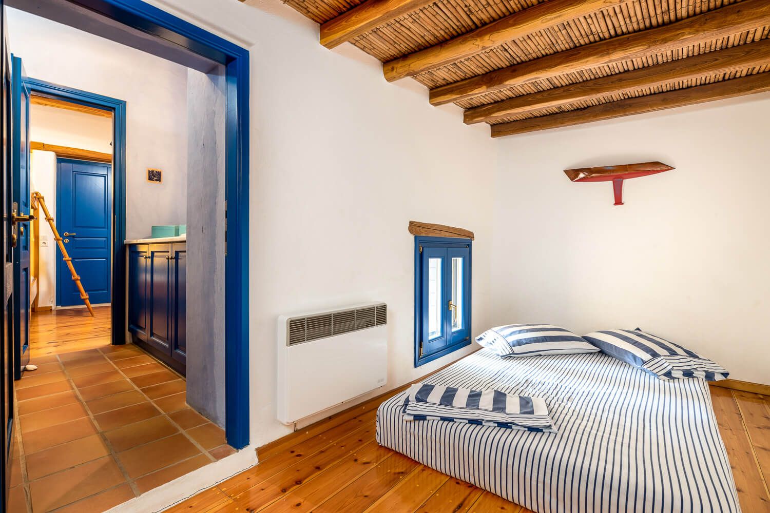 Elegant simplicity inside a traditional Greek village bedroom