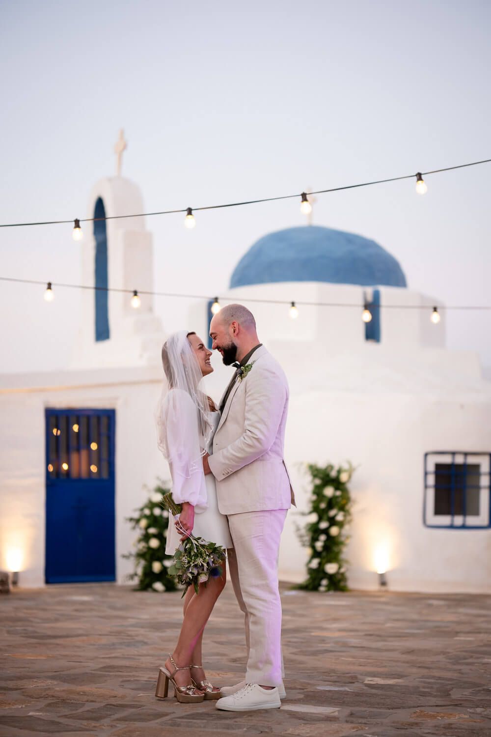 Bride and groom posing  at The Secret View venue