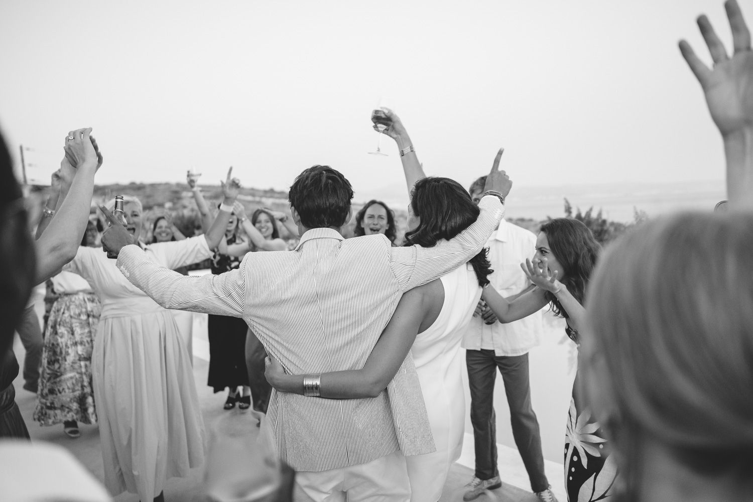 Couple dancing at a wedding party in Paros Greece